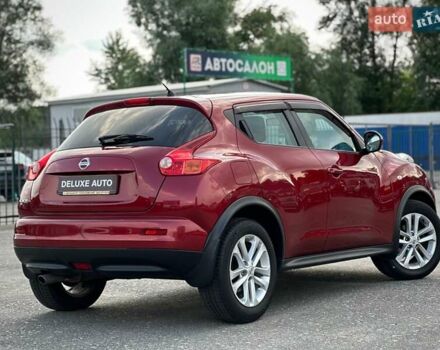 Червоний Ніссан Жук, об'ємом двигуна 1.6 л та пробігом 124 тис. км за 10200 $, фото 11 на Automoto.ua