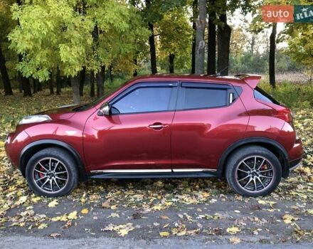 Красный Ниссан Жук, объемом двигателя 1.62 л и пробегом 131 тыс. км за 9900 $, фото 3 на Automoto.ua