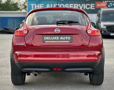 Червоний Ніссан Жук, об'ємом двигуна 1.6 л та пробігом 124 тис. км за 10200 $, фото 14 на Automoto.ua