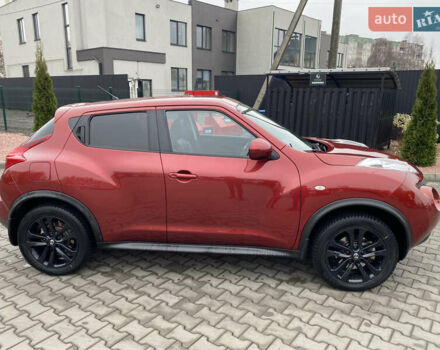 Красный Ниссан Жук, объемом двигателя 1.6 л и пробегом 119 тыс. км за 11000 $, фото 7 на Automoto.ua