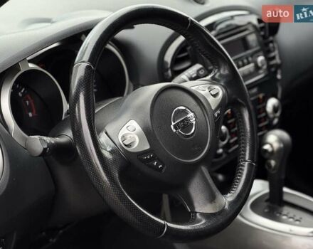Червоний Ніссан Жук, об'ємом двигуна 1.6 л та пробігом 109 тис. км за 11300 $, фото 10 на Automoto.ua
