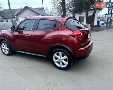 Червоний Ніссан Жук, об'ємом двигуна 1.6 л та пробігом 147 тис. км за 9999 $, фото 8 на Automoto.ua