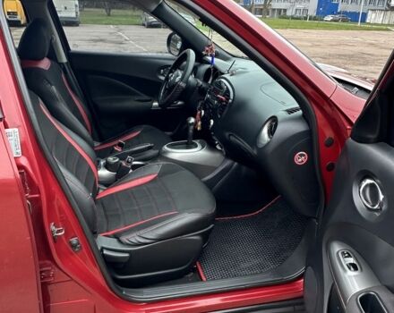 Красный Ниссан Жук, объемом двигателя 1.6 л и пробегом 214 тыс. км за 9000 $, фото 4 на Automoto.ua