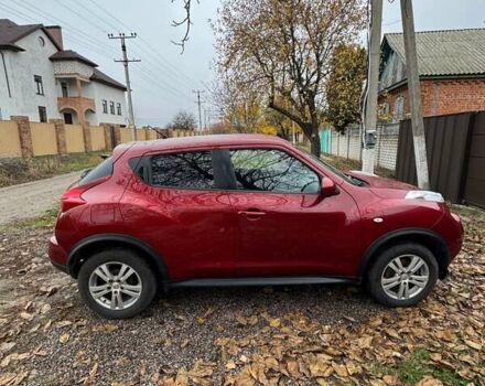 Червоний Ніссан Жук, об'ємом двигуна 1.6 л та пробігом 211 тис. км за 10500 $, фото 2 на Automoto.ua