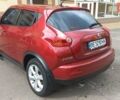 Червоний Ніссан Жук, об'ємом двигуна 1.6 л та пробігом 199 тис. км за 9700 $, фото 4 на Automoto.ua