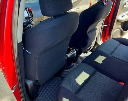 Червоний Ніссан Жук, об'ємом двигуна 1.6 л та пробігом 125 тис. км за 9700 $, фото 4 на Automoto.ua