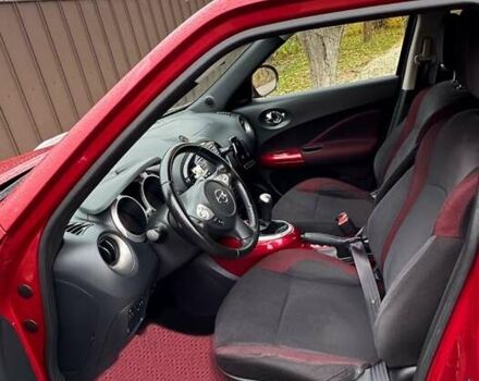 Червоний Ніссан Жук, об'ємом двигуна 1.6 л та пробігом 211 тис. км за 10500 $, фото 7 на Automoto.ua