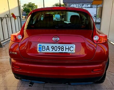 Червоний Ніссан Жук, об'ємом двигуна 1.6 л та пробігом 150 тис. км за 10200 $, фото 1 на Automoto.ua