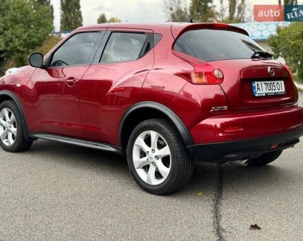Червоний Ніссан Жук, об'ємом двигуна 1.6 л та пробігом 126 тис. км за 9200 $, фото 7 на Automoto.ua