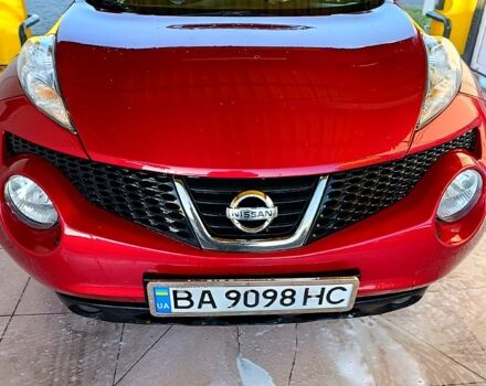 Червоний Ніссан Жук, об'ємом двигуна 1.6 л та пробігом 150 тис. км за 10200 $, фото 2 на Automoto.ua