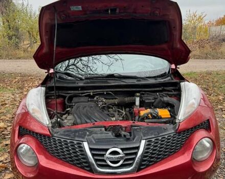 Червоний Ніссан Жук, об'ємом двигуна 1.6 л та пробігом 211 тис. км за 10500 $, фото 8 на Automoto.ua