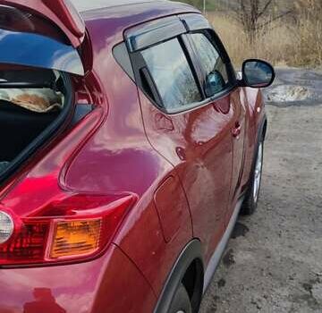 Красный Ниссан Жук, объемом двигателя 1.6 л и пробегом 110 тыс. км за 12000 $, фото 6 на Automoto.ua