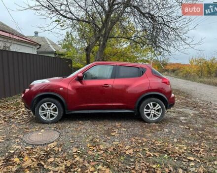Червоний Ніссан Жук, об'ємом двигуна 1.6 л та пробігом 211 тис. км за 10500 $, фото 3 на Automoto.ua
