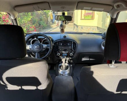 Червоний Ніссан Жук, об'ємом двигуна 1.6 л та пробігом 75 тис. км за 10200 $, фото 4 на Automoto.ua