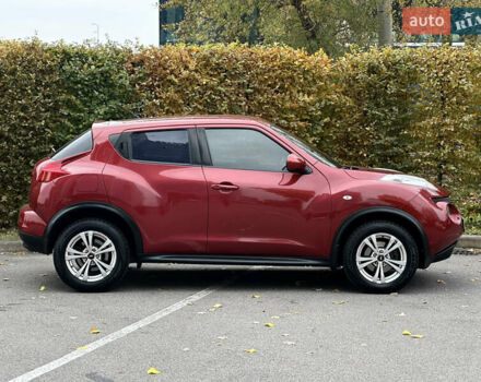 Красный Ниссан Жук, объемом двигателя 1.6 л и пробегом 130 тыс. км за 10500 $, фото 22 на Automoto.ua