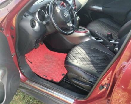 Червоний Ніссан Жук, об'ємом двигуна 1.6 л та пробігом 159 тис. км за 8900 $, фото 5 на Automoto.ua