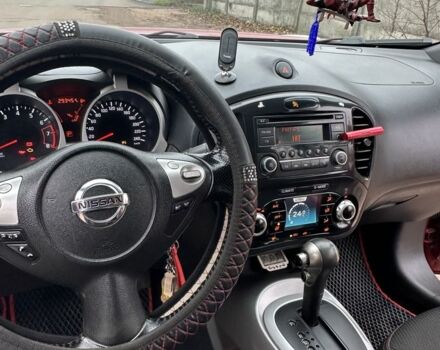 Красный Ниссан Жук, объемом двигателя 1.6 л и пробегом 214 тыс. км за 9000 $, фото 6 на Automoto.ua