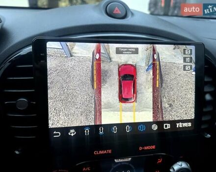 Червоний Ніссан Жук, об'ємом двигуна 1.6 л та пробігом 147 тис. км за 9999 $, фото 24 на Automoto.ua