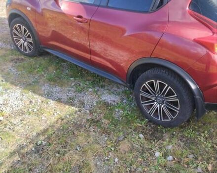 Червоний Ніссан Жук, об'ємом двигуна 1.6 л та пробігом 159 тис. км за 8900 $, фото 9 на Automoto.ua