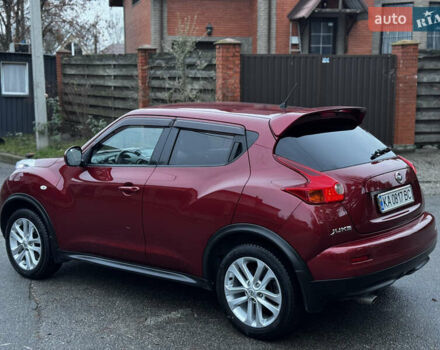 Червоний Ніссан Жук, об'ємом двигуна 1.6 л та пробігом 97 тис. км за 10750 $, фото 19 на Automoto.ua