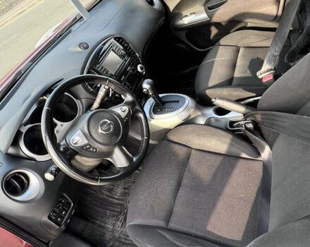 Красный Ниссан Жук, объемом двигателя 1.6 л и пробегом 61 тыс. км за 12500 $, фото 5 на Automoto.ua