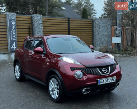 Червоний Ніссан Жук, об'ємом двигуна 1.6 л та пробігом 97 тис. км за 10750 $, фото 9 на Automoto.ua