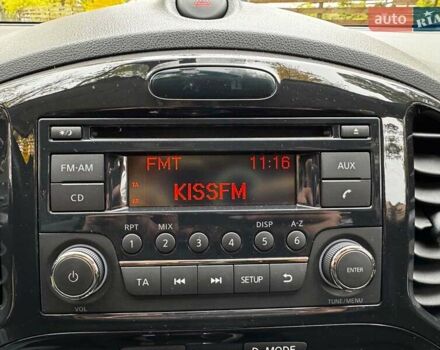 Красный Ниссан Жук, объемом двигателя 1.6 л и пробегом 131 тыс. км за 9990 $, фото 16 на Automoto.ua