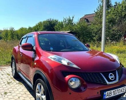 Червоний Ніссан Жук, об'ємом двигуна 1.6 л та пробігом 125 тис. км за 9700 $, фото 11 на Automoto.ua