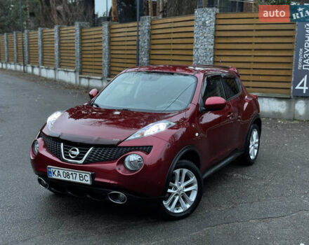 Червоний Ніссан Жук, об'ємом двигуна 1.6 л та пробігом 97 тис. км за 10750 $, фото 3 на Automoto.ua