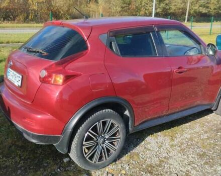 Червоний Ніссан Жук, об'ємом двигуна 1.6 л та пробігом 159 тис. км за 8900 $, фото 6 на Automoto.ua