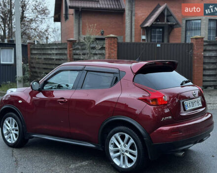 Червоний Ніссан Жук, об'ємом двигуна 1.6 л та пробігом 97 тис. км за 10750 $, фото 18 на Automoto.ua