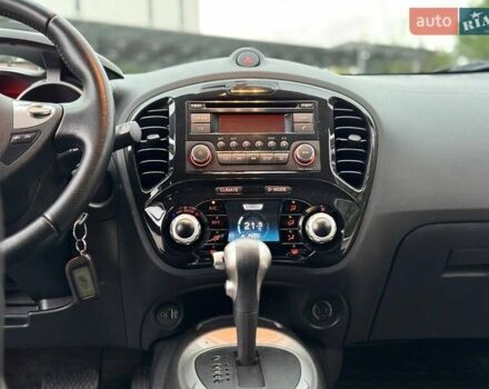 Червоний Ніссан Жук, об'ємом двигуна 1.6 л та пробігом 126 тис. км за 9200 $, фото 11 на Automoto.ua