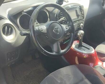 Красный Ниссан Жук, объемом двигателя 1.6 л и пробегом 175 тыс. км за 11000 $, фото 2 на Automoto.ua