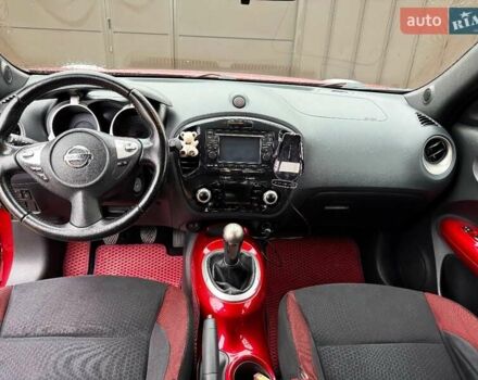 Червоний Ніссан Жук, об'ємом двигуна 1.6 л та пробігом 211 тис. км за 10500 $, фото 5 на Automoto.ua