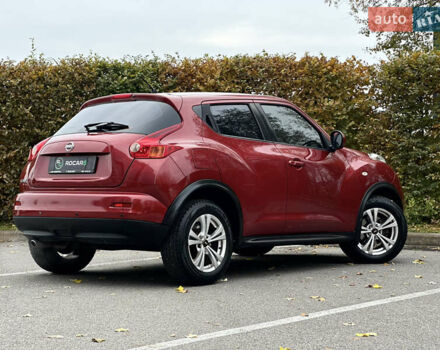 Красный Ниссан Жук, объемом двигателя 1.6 л и пробегом 130 тыс. км за 10500 $, фото 21 на Automoto.ua