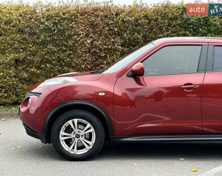 Красный Ниссан Жук, объемом двигателя 1.6 л и пробегом 130 тыс. км за 10500 $, фото 11 на Automoto.ua