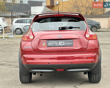 Красный Ниссан Жук, объемом двигателя 1.6 л и пробегом 130 тыс. км за 9999 $, фото 7 на Automoto.ua
