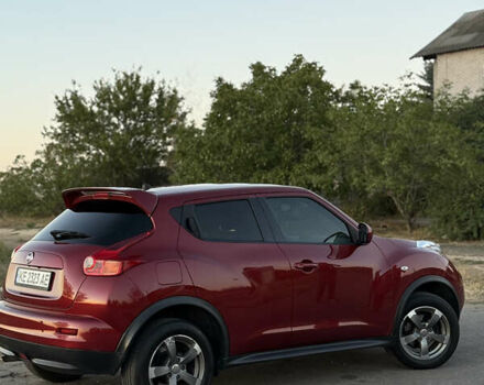 Красный Ниссан Жук, объемом двигателя 1.6 л и пробегом 168 тыс. км за 10900 $, фото 2 на Automoto.ua