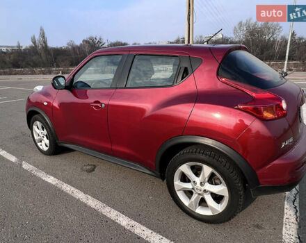 Красный Ниссан Жук, объемом двигателя 1.6 л и пробегом 61 тыс. км за 12500 $, фото 3 на Automoto.ua