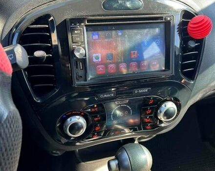 Червоний Ніссан Жук, об'ємом двигуна 1.6 л та пробігом 125 тис. км за 9700 $, фото 8 на Automoto.ua