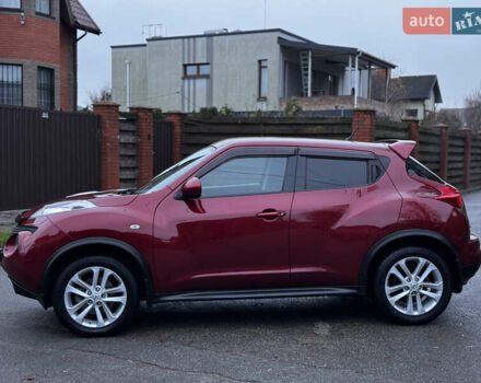 Червоний Ніссан Жук, об'ємом двигуна 1.6 л та пробігом 97 тис. км за 10750 $, фото 16 на Automoto.ua