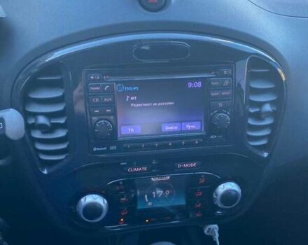 Червоний Ніссан Жук, об'ємом двигуна 1.6 л та пробігом 105 тис. км за 11450 $, фото 4 на Automoto.ua