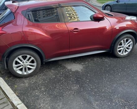 Червоний Ніссан Жук, об'ємом двигуна 1.6 л та пробігом 120 тис. км за 10500 $, фото 1 на Automoto.ua