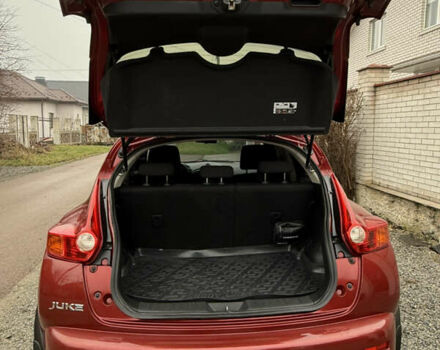 Красный Ниссан Жук, объемом двигателя 1.6 л и пробегом 93 тыс. км за 11000 $, фото 6 на Automoto.ua