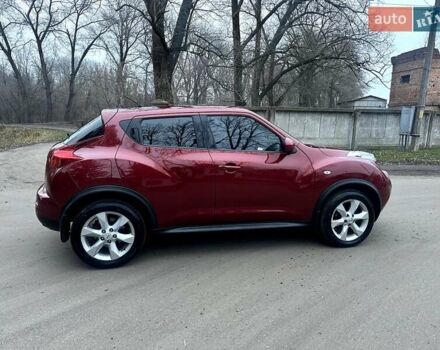 Червоний Ніссан Жук, об'ємом двигуна 1.6 л та пробігом 147 тис. км за 9999 $, фото 5 на Automoto.ua