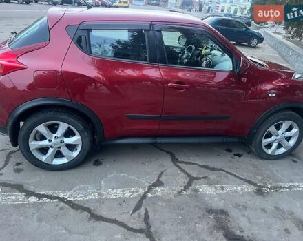 Червоний Ніссан Жук, об'ємом двигуна 1.6 л та пробігом 137 тис. км за 10800 $, фото 2 на Automoto.ua