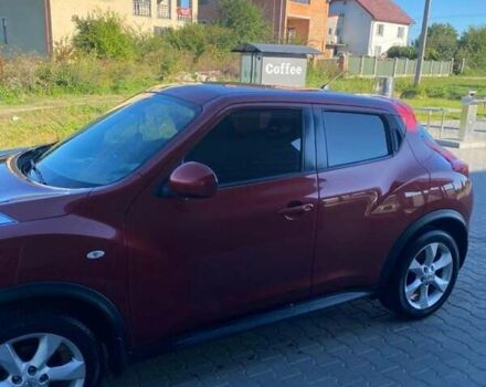 Червоний Ніссан Жук, об'ємом двигуна 1.6 л та пробігом 105 тис. км за 11450 $, фото 1 на Automoto.ua