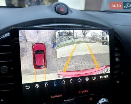 Червоний Ніссан Жук, об'ємом двигуна 1.6 л та пробігом 147 тис. км за 9999 $, фото 25 на Automoto.ua