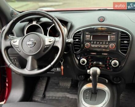 Червоний Ніссан Жук, об'ємом двигуна 1.6 л та пробігом 126 тис. км за 9200 $, фото 9 на Automoto.ua