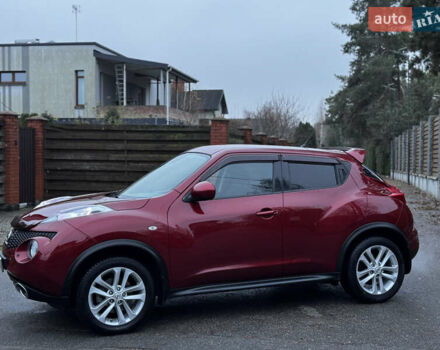 Червоний Ніссан Жук, об'ємом двигуна 1.6 л та пробігом 97 тис. км за 10750 $, фото 17 на Automoto.ua